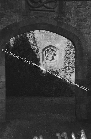 LISMORE CASTLE  CREST THROUGH ARCHWAY NEAR GARDEN